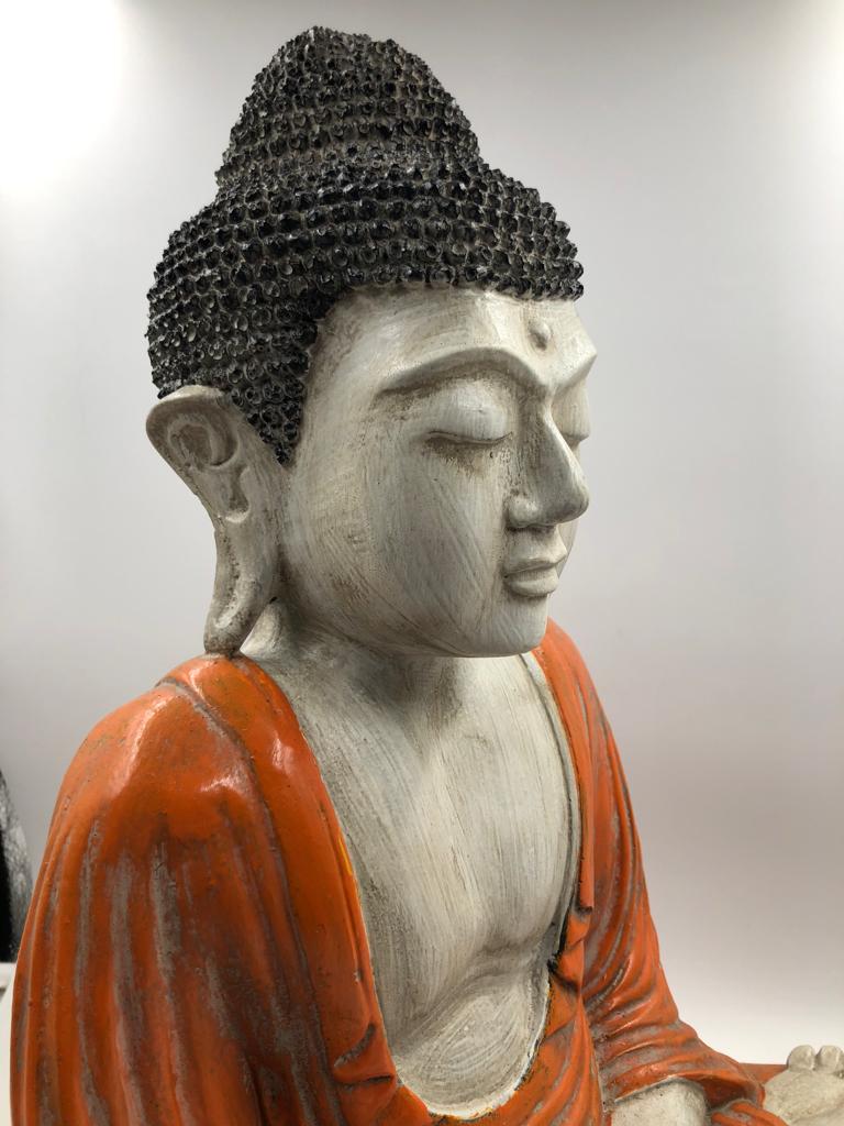 buddha in resina dipinta a mano da artigiani indonesiani